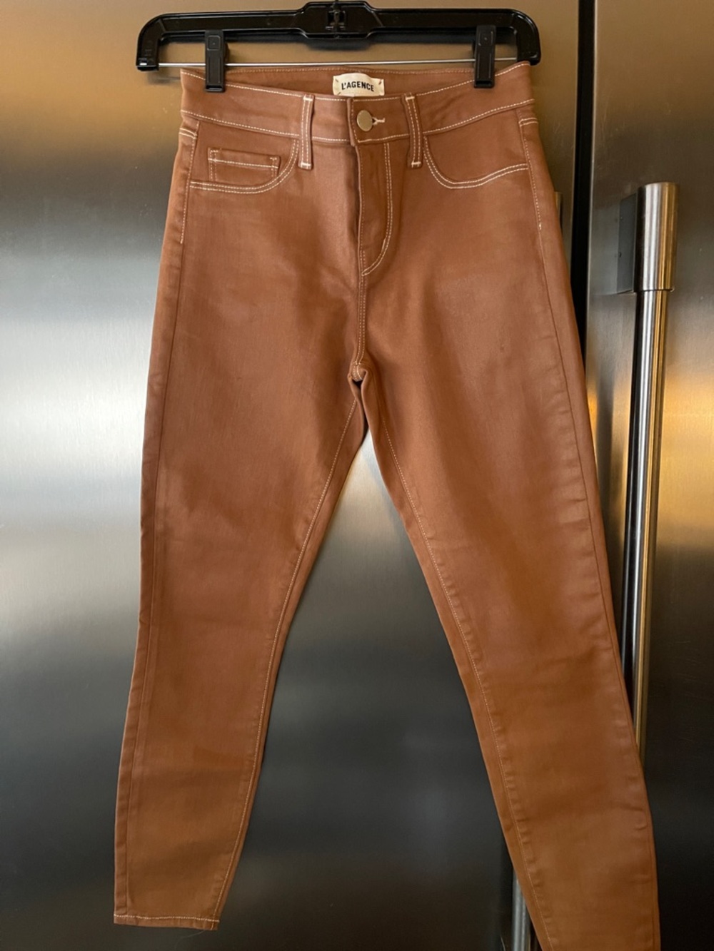 L’Agence Paris coated camel colored jeans
